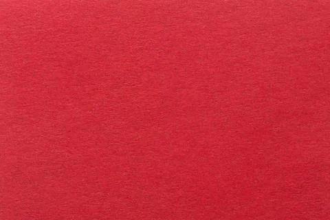 A textured red background with a subtle screen pattern. Stock Photos