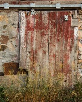 Textured red barn door Stock Photos