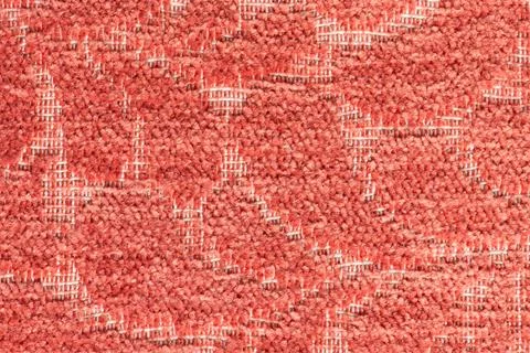 Textured red patterned carpet texture background close up Stock Photos