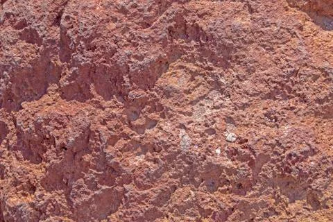 Textured red stone rought surface, rocky background, structure Stock Photos