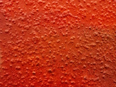 Textured Red Surface Featuring Unique Patterns That Showcase Depth and Intr.. Stock Photos