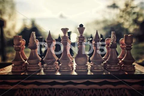 Textured retro effect photo of chess on board concept Stock Photos