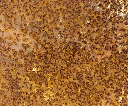 Textured rusty surface of old iron dirty brown with light intersperses, metal Stock Photos
