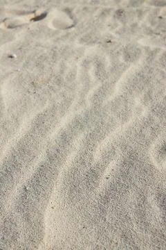 Textured Sand Patterns and Ridges Close-Up Beach Detail Foto stock