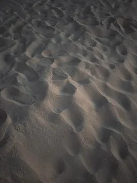 Textured Sand Surface at Dusk Fotos de archivo