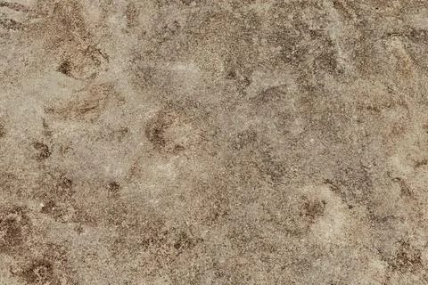 Textured sandy surface with various shades of brown and subtle patterns, re.. 스톡 사진