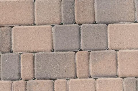 Textured-Stone-Paving-Blocks-Pattern-on-the-Ground-for-Hardscape-Design Stock Photos