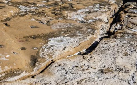 Textured stone sandstone surface. Stock Photos