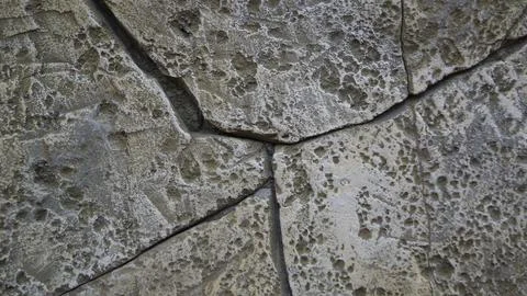 Textured Stone Surface with Cracks Stock Photos