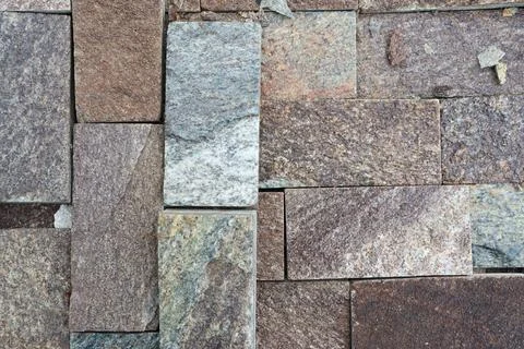 Textured Stone Wall Design Featuring a Variety of Beautiful Natural Stones and 写真素材