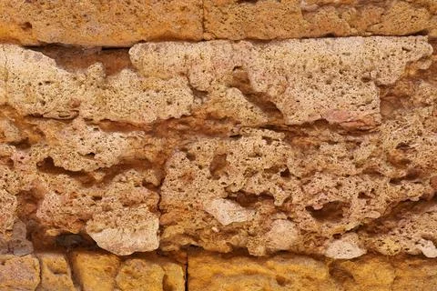 Textured Stone Wall With Distinctive Patterns And Colors Stock Photos