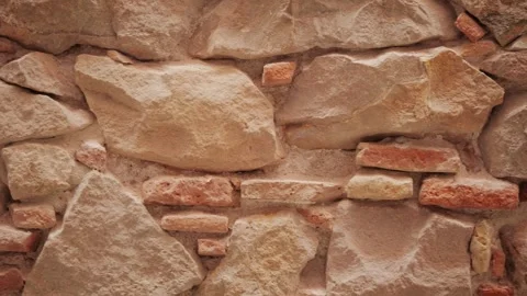 A Textured Stone Wall Featuring Rustic Charm That Adds Character and Beauty to Stock Footage 280587215