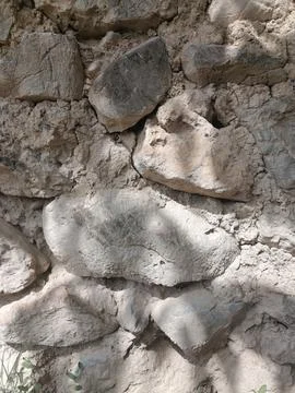 Textured stone wall harmony Stock Photos
