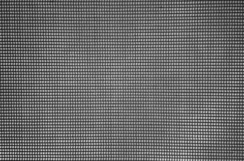Textured surface of checkered fabric Stock Photos