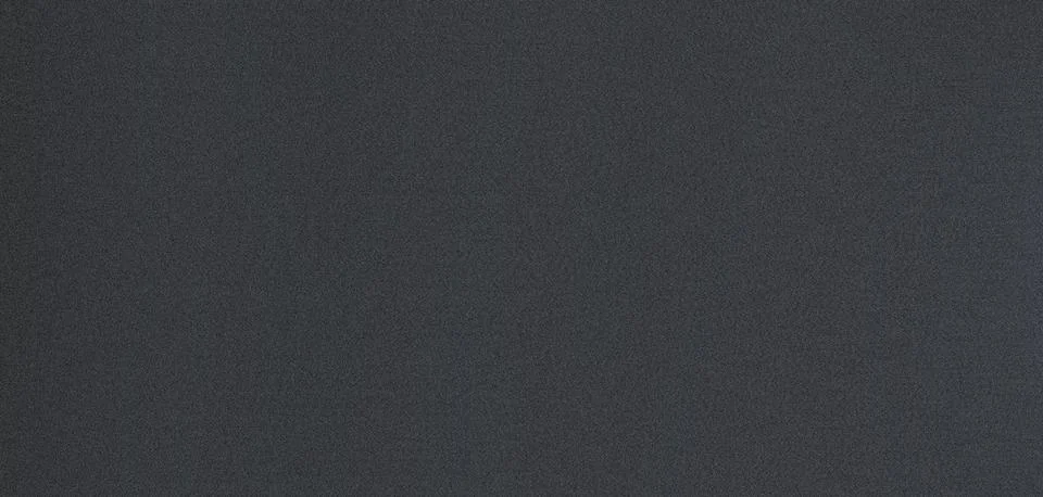Textured surface of a dark grey background Stock Photos
