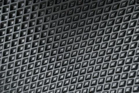 Textured surface with diamond pattern, emphasizing the intricate design of a Stock Photos