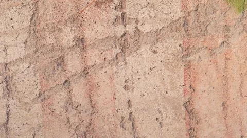 A textured surface with earthy tones background, featuring subtle lines and.. Video stock 318398949
