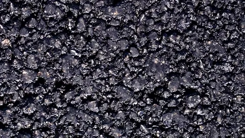 Textured surface of fresh black asphalt. Stock Footage 341109889