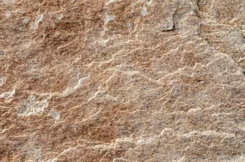 Textured surface of granite boulder Stock Photos