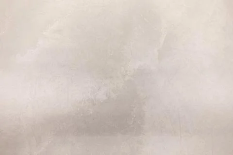 Textured surface of light beige material showcasing subtle patterns and tones in Foto stock