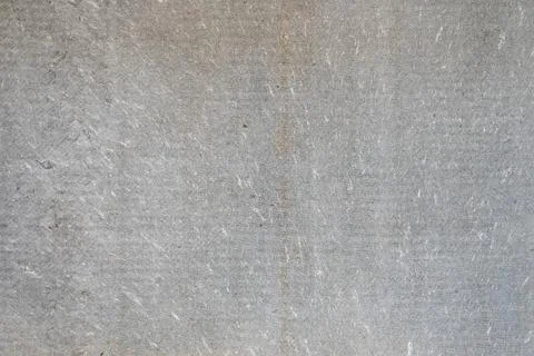 Textured surface of light gray stone with subtle patterns and lines Stock Photos