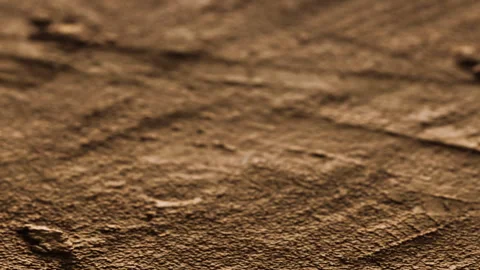 Textured surface with markings from tools or nature in a rural setting Stock Footage 340016340