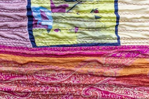 Textured surface of pleated silk patchwork fabric Stockfoto's