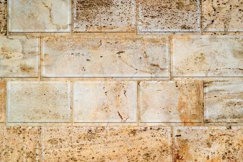 Textured surface of a stone wall Stock Photos