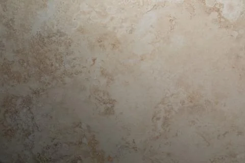 Textured surface with subtle patterns and warm tones in a neutral color scheme 스톡 사진