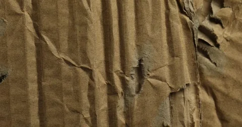 Textured surface of torn and crumpled brown cardboard Stock Footage 293685321