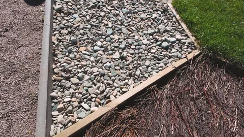 Textured surfaces made from pine bark, branches, pebbles and end grain wood.  스톡 동영상 318181807