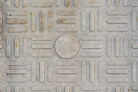 Textured Tactile Paving with Raised Rectangular Patterns for Accessibility Stock Photos