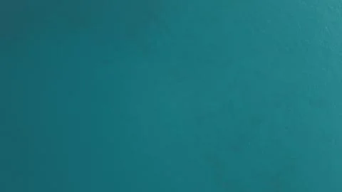 Textured teal background with subtle variations in color and sheen Stock Photos