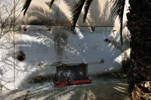 Textured wall with arabic writing Stock-Fotos