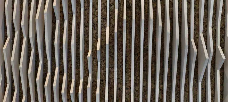 Textured wall panel with parallel vertical white slats Foto stock