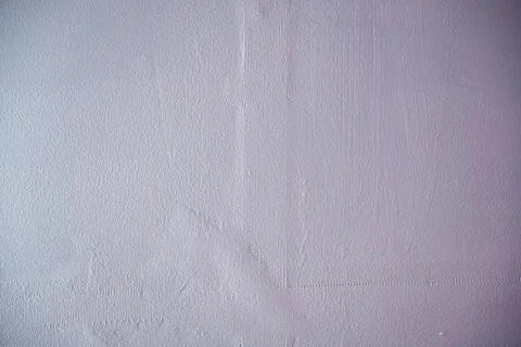A textured wall showing subtle uneven surface details Stock Photos