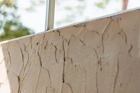 Textured wall surface close-up outdoor setting abstract image natural light.. Stock Photos