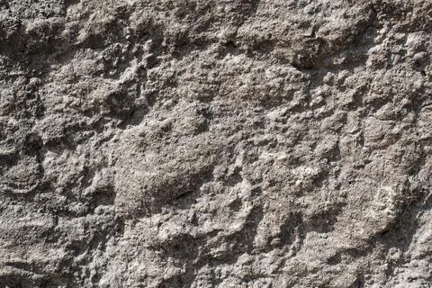 Textured wall surface showcasing intricate patterns and subtle 스톡 사진