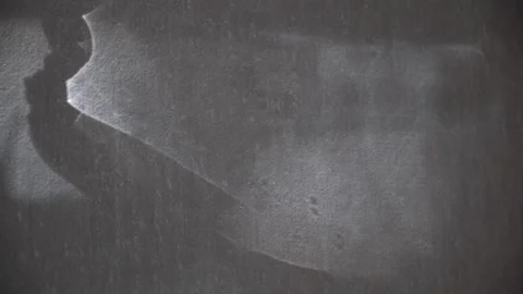 Textured wall, on which gleams of light cast fanciful shadows. The twilight.. Stock Footage 333662291