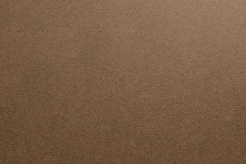 A textured, warm-toned brown surface with a subtle gradient effect Stock Photos