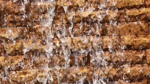 Textured waterfall cascades down Stock Footage 274012489