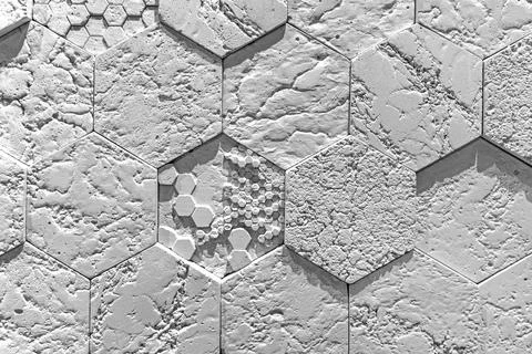 Textured white hexagonal wall tile pattern. Modern white wall made of hexagonal Stock Photos