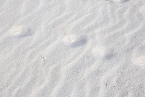 Textured White Sand Beach Background Stock-Fotos