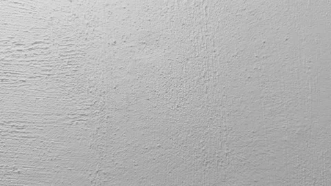 A textured white wall background surface with subtle variations and patterns Stock Footage 318404139
