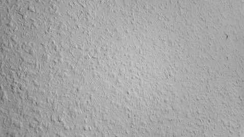 Textured White Wall With Subtle Patterns in Natural Light Indoors Stock Photos