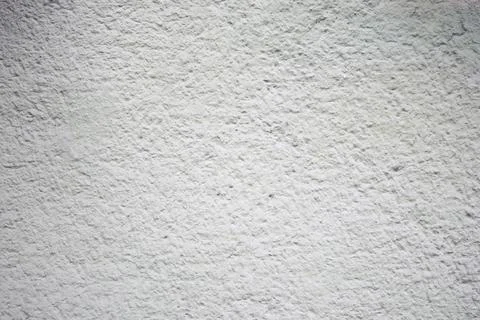 Textured white wall with subtle patterns and shadows Stock Photos
