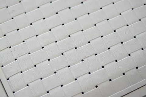 Textured white woven pattern canvas indoor setting close-up abstract style Foto stock