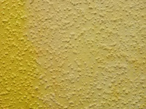 Textured Yellow Wall Surface Ideal for Various Creative Projects and Applic.. Stock Photos