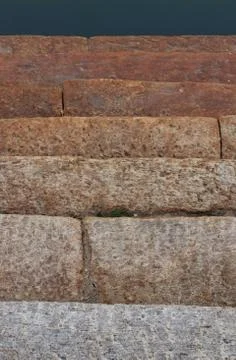 Textures and patterns of ancient steps for pond closeup Stock Photos