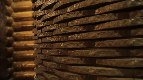 Textures and patterns of a stack of logs forming the wall of a rustic hut Stock Footage 267579138